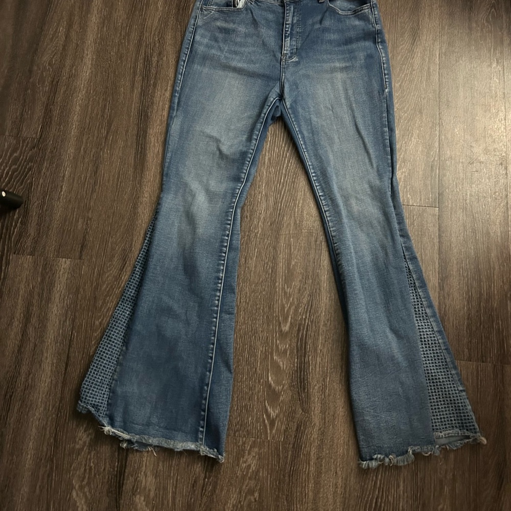 Chic Blue Flare Jeans with Distressed Hem